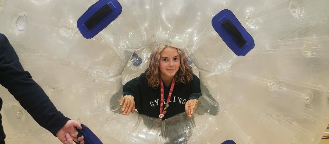 Student-in-an-inflatable-Zorbing-ball