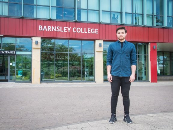 Aland Jawhar stood in front Barnsley College’s Old Mill Lane.