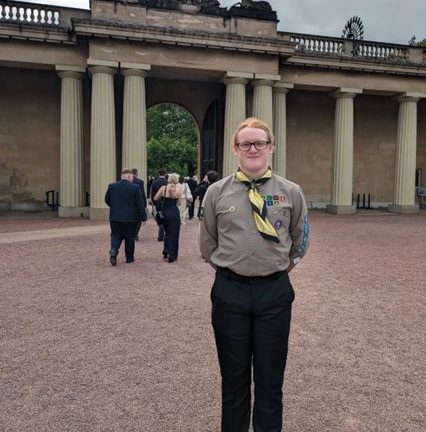 Esports student, Daniel Collier, inside Buckingham Palace gardens.