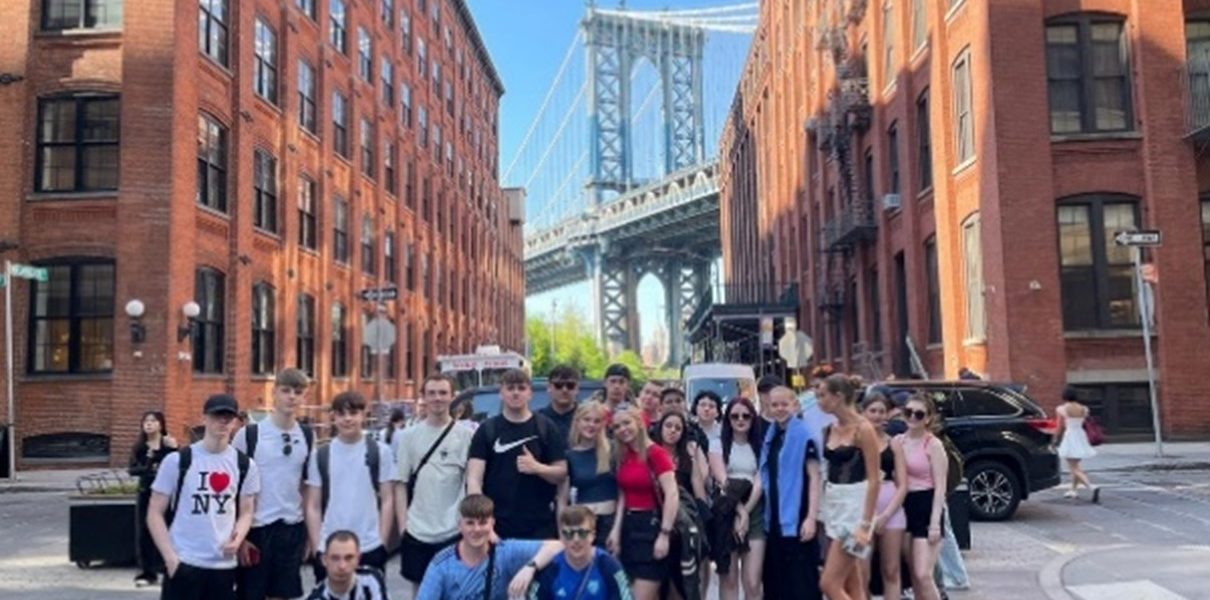 Travel and Tourism and Public Services students in front of Brooklyn Bridge.