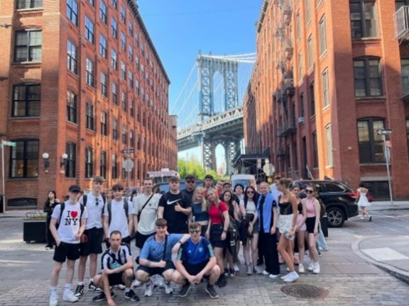Travel and Tourism and Public Services students in front of Brooklyn Bridge.