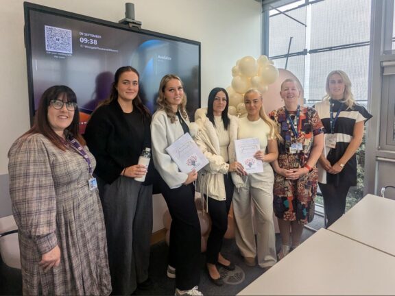 The four alumni alongside Barnsley Council Social Worker and College staff