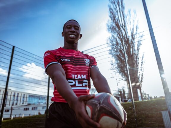 Kuzivakwashe Mazani holding rugby ball