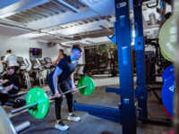 Man working out in Honeywell Sports Village Gym